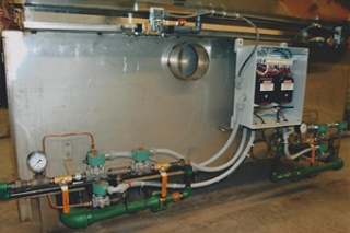 Large gas-heated black oxide tank with electronic ignition system.