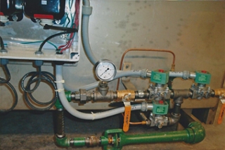 Close up ofignition system on a gas-heated black oxide tank