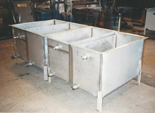Stainless Steel Cascading Rinse Tanks prior to final inspection in welding department.